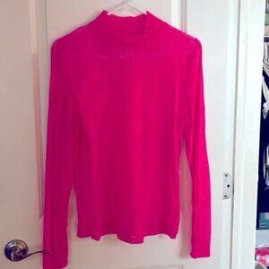 Neon pink lace turtleneck.
